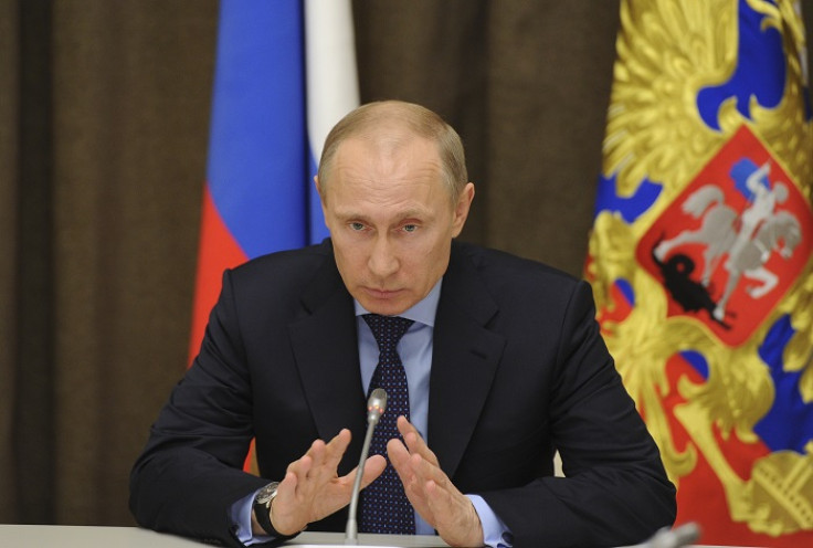 Russian President Vladimir Putin said Crimea's referendum fully complies with international law despite being roundly condemned by world leaders.