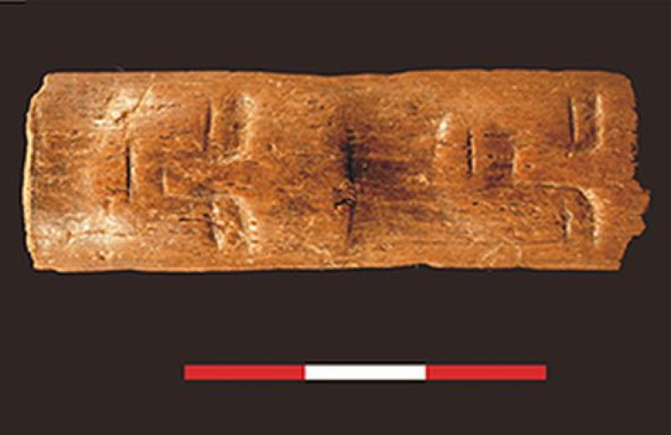 9,000-Year-Old Bone Wand with Etched Human Faces Discovered in Syria