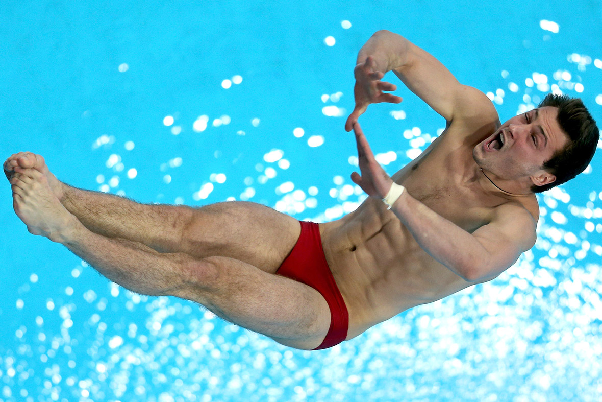 Oleksandr Bondar of Ukraine dives in the Mens 10m Platform semi final