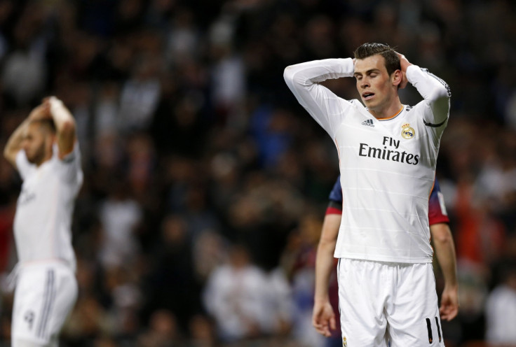 Real Madrid's Gareth Bale reacts after Barcelona won La Liga's second 'Clasico' soccer match of the season at Santiago Bernabeu stadium in Madrid March 23, 2014.