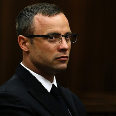 Oscar Pistorius contains his emotions as his murder trial for killing Reeva Steenkamp is adjourned in Pretoria