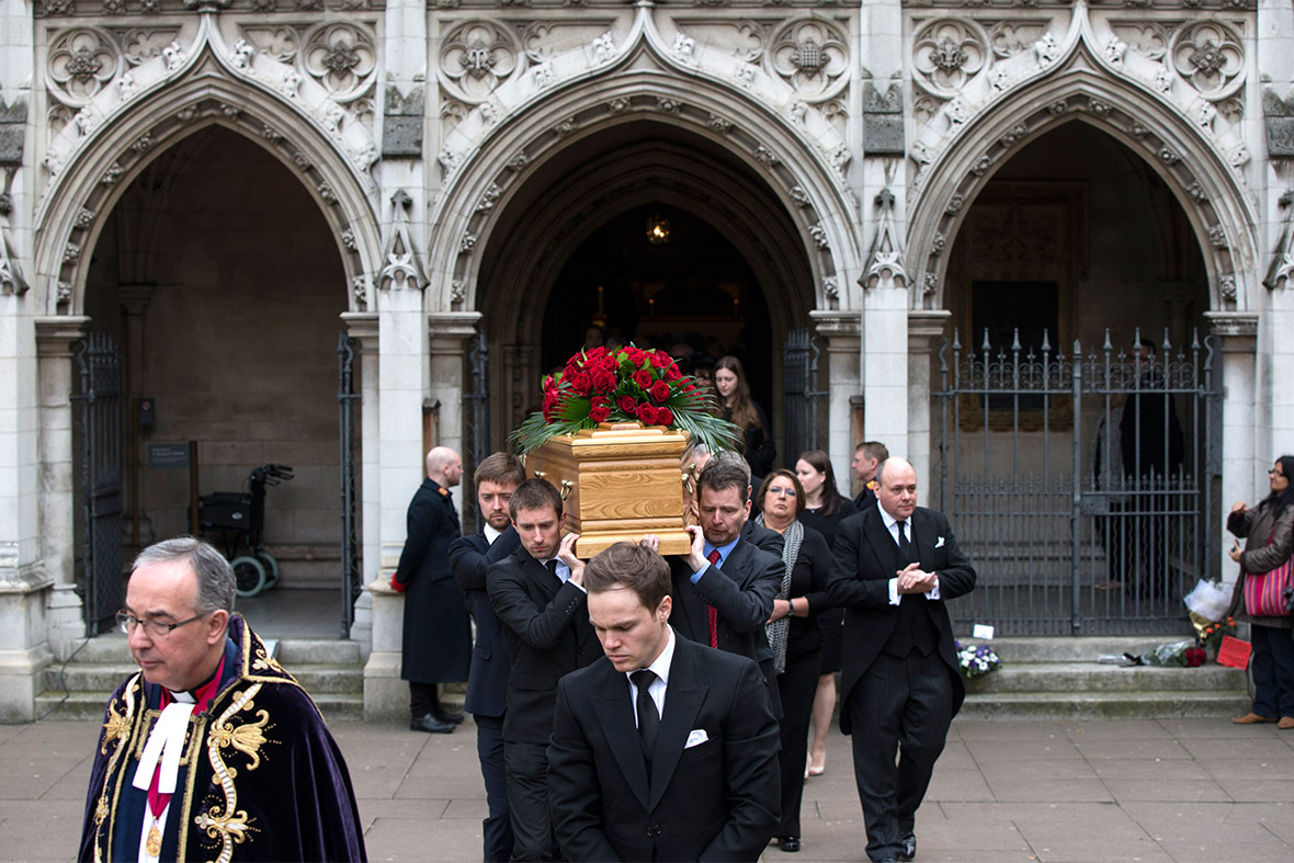 The sons and grandsons of Tony Benn carry his coffin out of St Margarets Church following his funeral