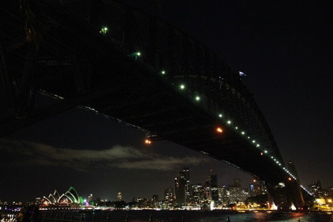 The Sydney Harbour Bridge is stripped of its usual fluorescent splendour for Earth Hour, which is now in its eighth year.