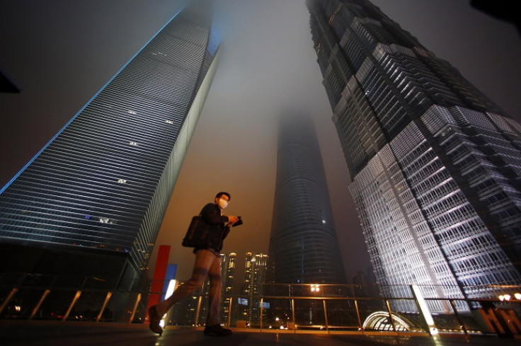 Skyscrapers in Shanghai's financial district of Pudong are unrecognisable with all their lights switched off for the annual Earth Hour event.