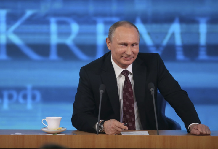 President Vladimir Putin appears on Russian state news agency RIA Novosti in December, 2013.