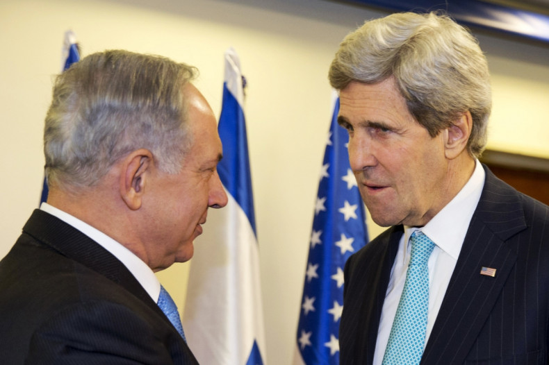 Israeli Prime Minister Benjamin Netanyahu (L) meets with U.S. Secretary of State John Kerry as they meet in Jerusalem