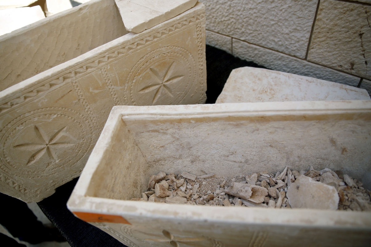 11 ancient Jewish burial boxes have been recovered in a raid on antiquities dealers in Jerusalem