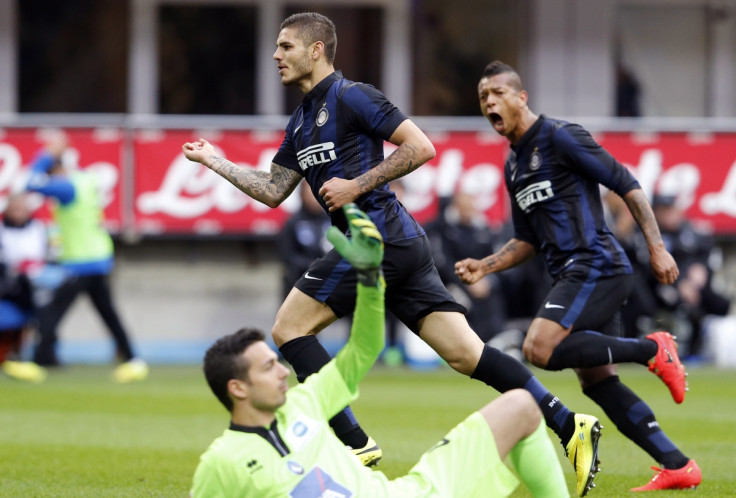 Inter Milan's Mauro Icardi (L) celebrates with his team mate Fredy Guarin after scoring a goal against Atalanta during their Serie A soccer match at the San Siro stadium in Milan March 23, 2014.