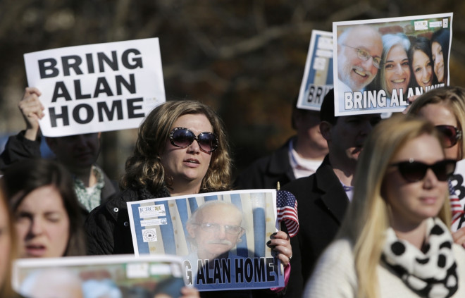 Demonstrators gather during a rally for U.S. detainee Alan Gross in Lafayette Square in Washington Demonstrators gather during a rally for U.S. detainee Alan Gross in Lafayette Square in Washington