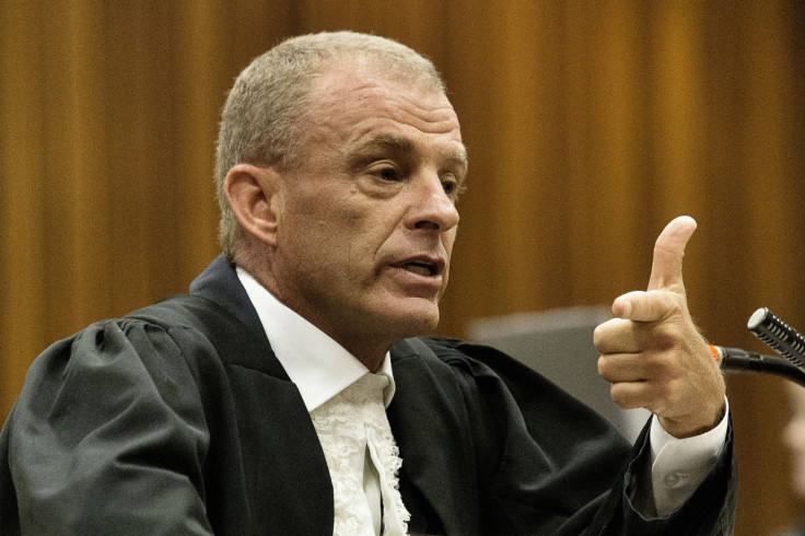 Gerrie Nel attempted to discredit Oscar Pistorius and laughed loudly at him during cross-examination