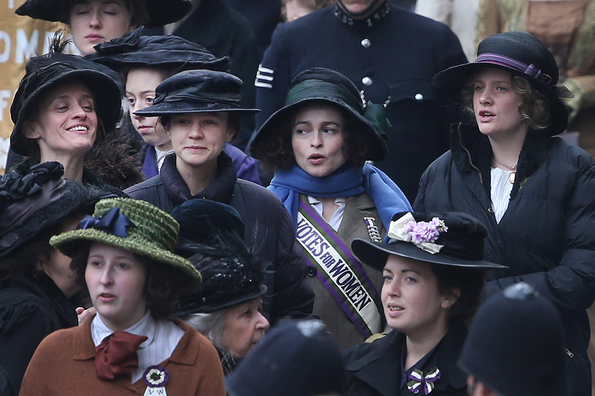 Anne-Marie Duff, Carey Mulligan, Helena Bonham Carter and Romola Garai keep warm during a break in filming