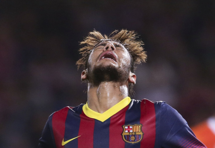 Barcelona's Neymar reacts after missing a scoring opportunity during their Spanish First Division soccer match against Granada at Nuevo Los Carmenes stadium in Granada, April 12, 2014.