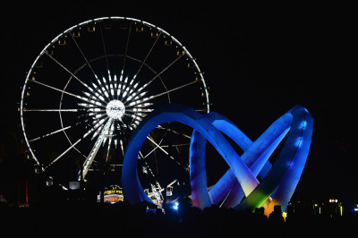 Ferris wheel and Lightweaver art installation by Alexis Rochas Ferris wheel and Lightweaver art installation by Alexis Rochas