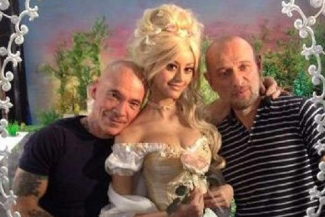 Zahia Dehar dressed as Marie Antoinette, with artist Pierre & Gilles