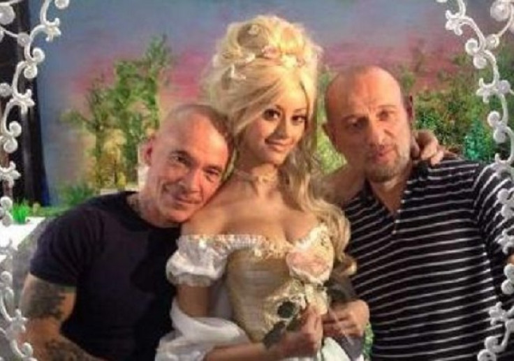 Zahia Dehar dressed as Marie Antoinette, with artist Pierre & Gilles