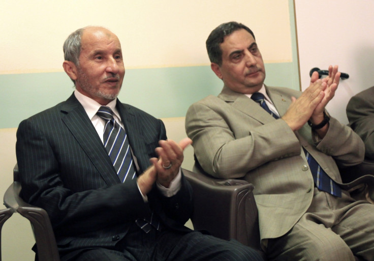 Mustafa Abdel Jalil (L), former chairman of the Libyan National Transitional Council, and Jordan's ambassador to Libya Fawaz al-Eitan