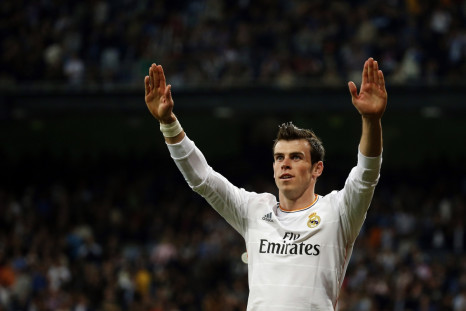 Real Madrid's Gareth Bale celebrates his goal against Almeria during their Spanish first division soccer match at Santiago Bernabeu stadium in Madrid, April 12, 2014.