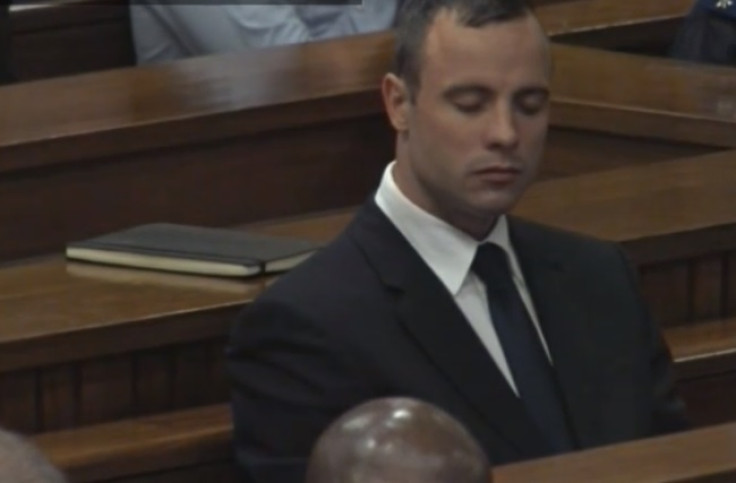 Oscar Pistorius closes his eyes after the end of gruelling cross-examination by prosecutor Gerrie Nel
