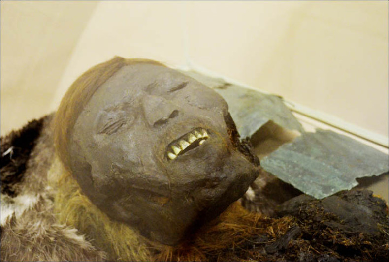 Close-up of the red haired man's mummified face