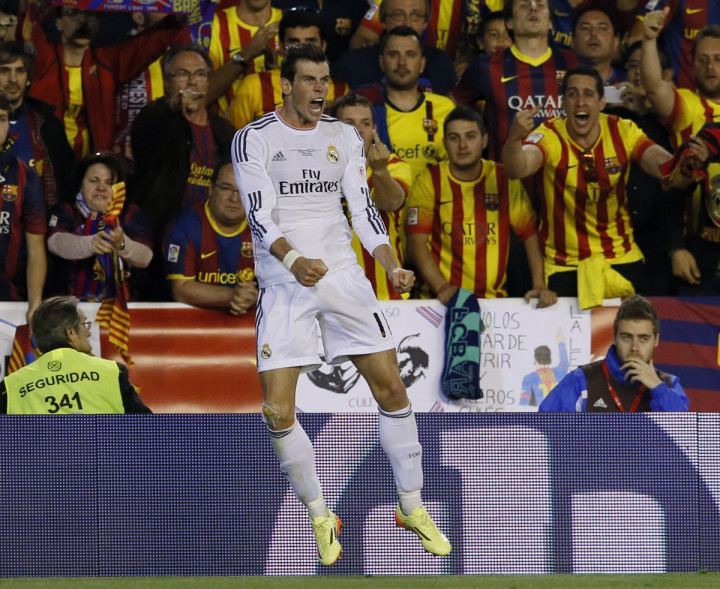 Real Madrid's Gareth Bale celebrates his goal during their King's Cup final soccer match against Barcelona's at Mestalla stadium in Valencia April 16, 2014. Real Madrid's Gareth Bale celebrates his goal during their King's Cup final soccer match against Barcelona's at Mestalla stadium in Valencia April 16, 2014.