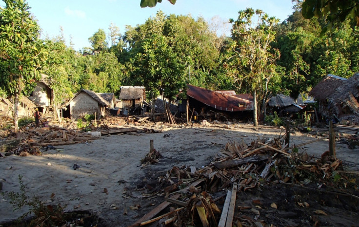 Partially destroyed houses are seen after a tsunami hit in the Venga village in Solomon Islands on February 6