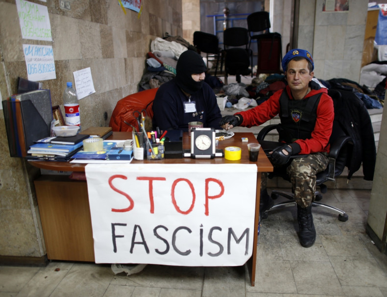 Pro-Russia protesters take a break inside a regional government building in Donetsk, in eastern Ukraine.