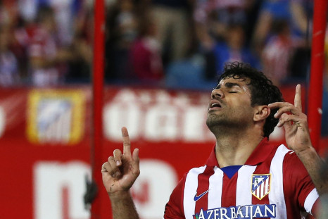 Atletico Madrid's Diego Costa celebrates his goal during their Spanish first division soccer match against Elche at Vicente Calderon stadium in Madrid April 18, 2014.