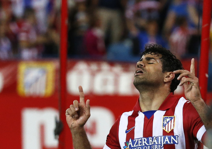 Atletico Madrid's Diego Costa celebrates his goal during their Spanish first division soccer match against Elche at Vicente Calderon stadium in Madrid April 18, 2014.