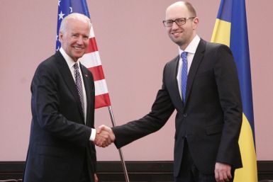 U.S. Vice President Joe Biden (L) shakes hands with Ukraine's Prime Minister Arseny Yatseniuk during a meeting in Kiev,