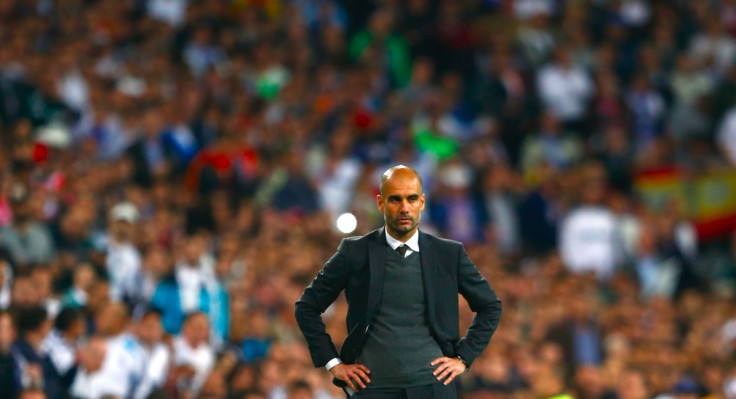 Bayern Munich's coach Josep Guardiola reacts during the Champions League semi-final first leg soccer match against Real Madrid at Santiago Bernabeu stadium in Madrid April 23, 2014.