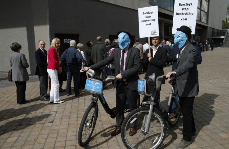 Demonstrators protest as shareholders queue to enter the Barclays AGM in central London April 24, 2014