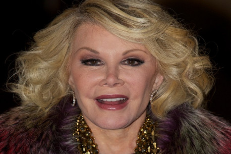 Lawyers have demanded Joan Rivers apologise for crass remarks about the Cleveland kidnap victims held captive by Raul Castro
