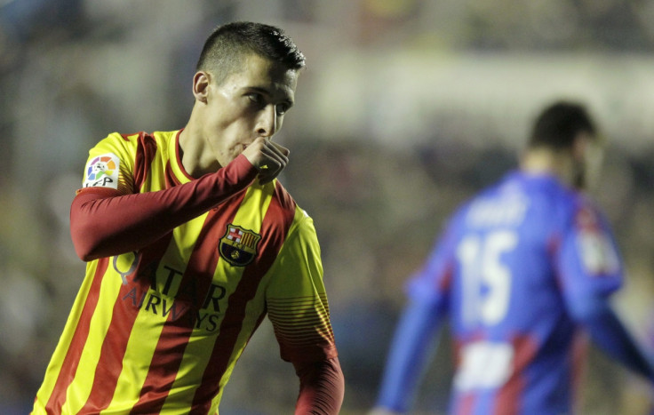 Barcelona's Cristian Tello celebrates after he scored against Levante during their Spanish King's Cup quarter-final first leg soccer match at the Ciudad de Valencia stadium in Valencia, January 22, 2014.