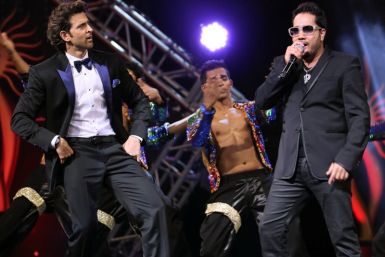 Hrithik Roshan and Bollywood singer Mika Singh performing at IIFA 2014