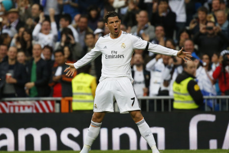 Real Madrid's Cristiano Ronaldo celebrates his goal against Osasuna during their Spanish First Division soccer match at Santiago Bernabeu stadium in Madrid April 26, 2014.