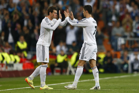 Real Madrid's Cristiano Ronaldo is substituted for Graeth Bale (L) during their Champion's League semi-final first leg soccer match against Bayern Munich at Santiago Bernabeu stadium in Madrid, April 23, 2014.