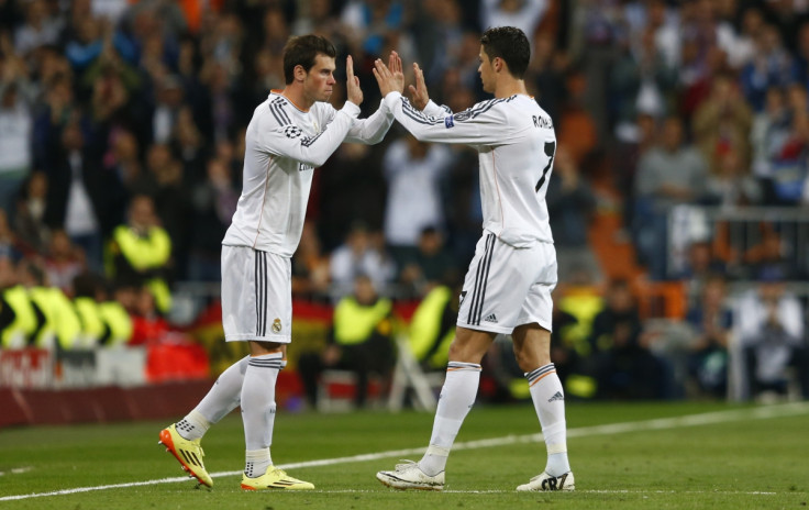 Real Madrid's Cristiano Ronaldo is substituted for Graeth Bale (L) during their Champion's League semi-final first leg soccer match against Bayern Munich at Santiago Bernabeu stadium in Madrid, April 23, 2014.