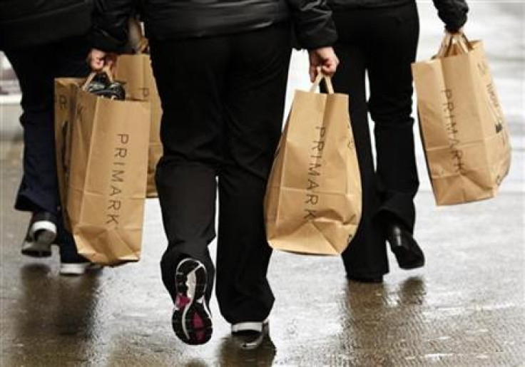 Shoppers carrying Primark bags