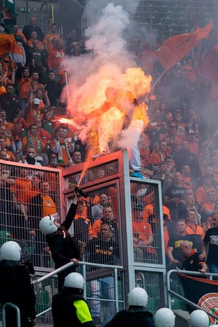 Polish football fan on fire