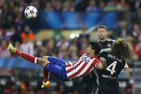 Atletico Madrid's Diego Costa lines up an overhead kick next to Chelsea's David Luiz during their Champion's League semi-final first leg soccer match at Vicente Calderon stadium in Madrid, April 22, 2014.