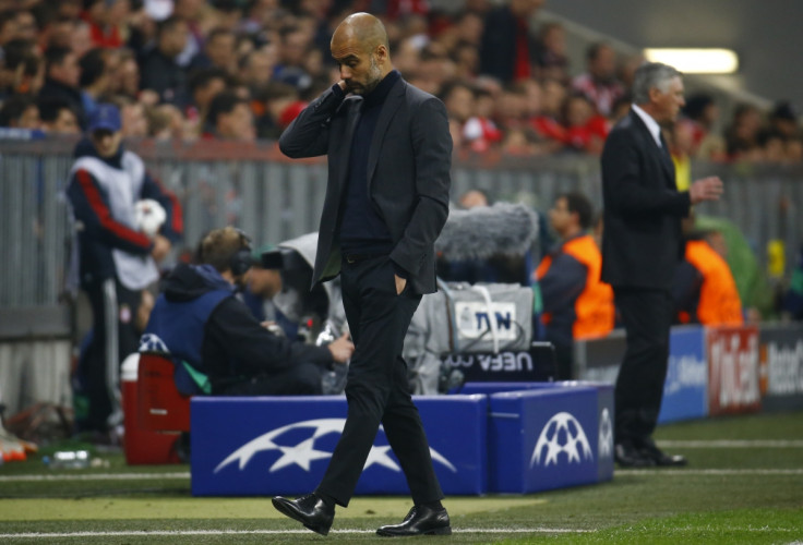 Bayern Munich's coach Josep Guardiola reacts during their Champion's League semi-final second leg soccer match against Real Madrid in Munich April 29, 2014.