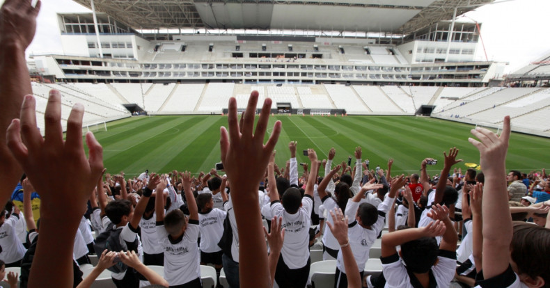 Fans at Arena de Sao Paulo Stadium, one of the venues for the 2014 World Cup in Sao Paulo, Brazil