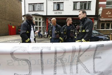 Firefighters on strike outside their northeast London fire station in September, 2013.