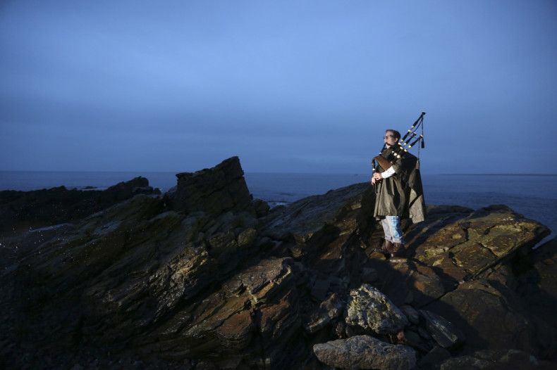 Piper Danny Hutcheson, 16, poses for a photograph on the coastline of Fraserburgh in Aberdeenshire, Scotland March 6, 2014. Danny will vote "No" in the referendum because he is unsure what would happen with a "Yes" vote.