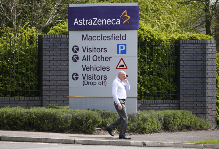 A man walks past an AstraZeneca site in Macclesfield, north England April 28, 2014