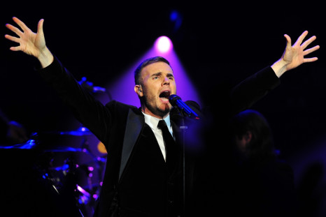Gary Barlow performs at a fund-raising concert in front of royalty at the Royal Albert Hall in London