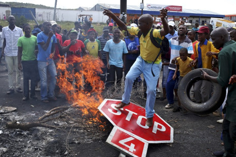 Protesters burned tyres and barricaded roads in Johannesburg's Alexandra township on Friday.