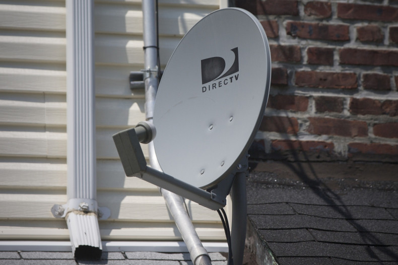 A DirecTV dish is seen outside a home in the Queens borough of New York