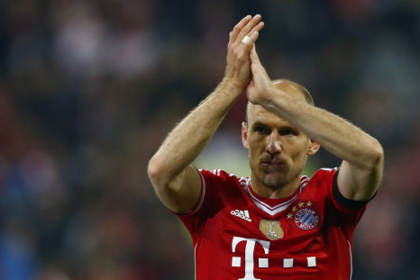 Bayern Munich's Arjen Robben walks out the pitch after the Champions League semi-final second leg soccer match against Real Madrid at the Arena stadium in Munich, April 29, 2014.