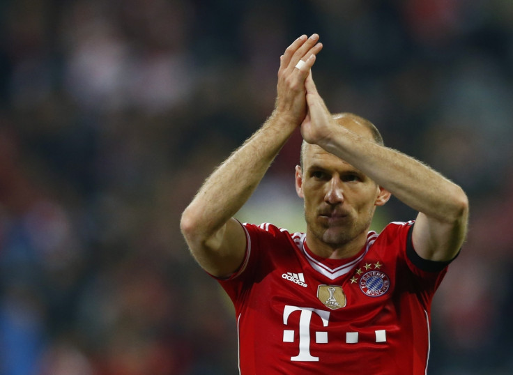 Bayern Munich's Arjen Robben walks out the pitch after the Champions League semi-final second leg soccer match against Real Madrid at the Arena stadium in Munich, April 29, 2014.